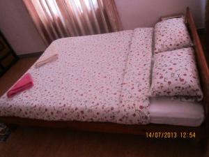 Postel nebo postele na pokoji v ubytování Le Rhododendron Chambres D'hotes
