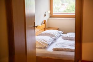 A bed or beds in a room at Appartements Hochlega