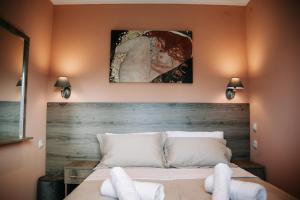 Ένα ή περισσότερα κρεβάτια σε δωμάτιο στο 13 Brothers Bungalows