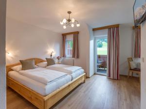 Postel nebo postele na pokoji v ubytování Appartementhaus Fuchs
