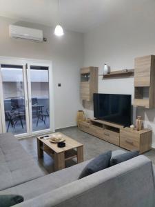 TV a/nebo společenská místnost v ubytování Felou's House 1