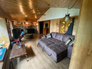 Posezení v ubytování Chalet "Ici et maintenant, sur le lac"