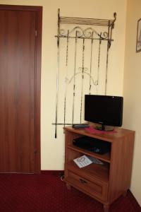 TV a/nebo společenská místnost v ubytování Zajazd Skorpion B&B