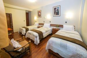 Postel nebo postele na pokoji v ubytování Antawasi Hotel + 37 fotografií