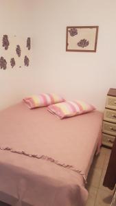 Giường trong phòng chung tại CASA AMBROZIA +61 ảnh