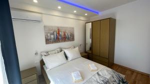 Postel nebo postele na pokoji v ubytování Luxury APARTMAN BILI