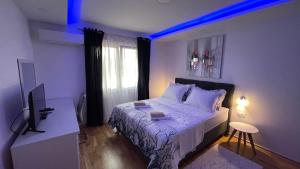 Postel nebo postele na pokoji v ubytování Luxury APARTMAN BILI