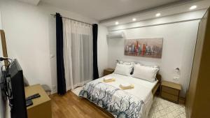 Кровать или кровати в номере Luxury APARTMAN BILI