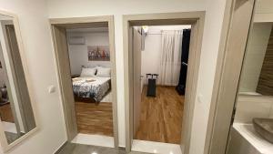 Postel nebo postele na pokoji v ubytování Luxury APARTMAN BILI