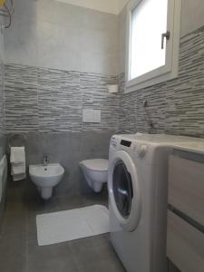 Kúpeľňa v ubytovaní Monolocale Arbus R0478
