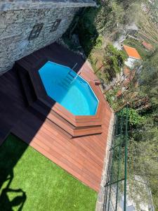 Der Swimmingpool an oder in der Nähe von Casa da Encosta Douro Valley