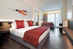 Postel nebo postele na pokoji v ubytování Olivia Balmes Hotel