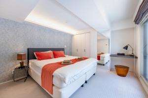 Cama ou camas em um quarto em NC Square Shinjuku -All Suite Residence-