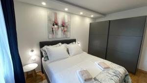 Postel nebo postele na pokoji v ubytování Luxury APARTMAN BILI