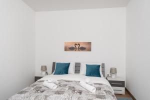 Postel nebo postele na pokoji v ubytování Apartman Palada