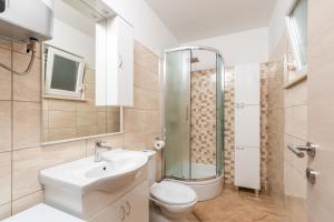 Koupelna v ubytování Apartman Palada + 31 fotografií
