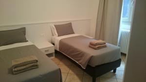 Postel nebo postele na pokoji v ubytování Lakecomoweb Apartments