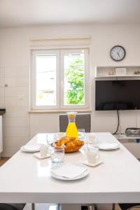 TV a/nebo společenská místnost v ubytování Apartman Palada
