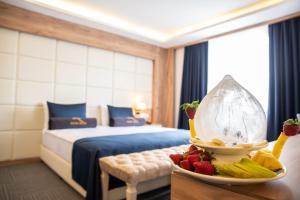 Postel nebo postele na pokoji v ubytování Malia otel + 7 fotografií