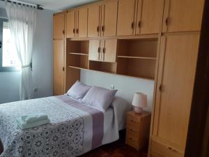 Postel nebo postele na pokoji v ubytování Piso Montesol