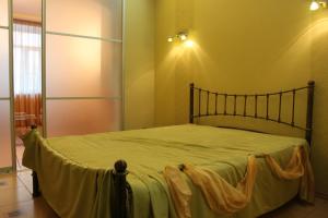 Cama ou camas em um quarto em Apart-Hotel on Preobrajenskaya 24