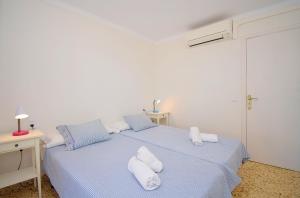 Postel nebo postele na pokoji v ubytování 134 Apartamento Pins-Tugores by Mallorca Charme
