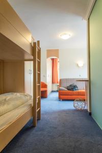 Un pat sau paturi într-o cameră la Taxenbacherhof