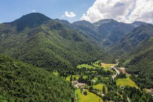 an aerial view of a valley in the mountains at Maso dell Apicoltore in Ledro