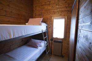 A bed or beds in a room at IseoLakeRental - Villa Alessandra