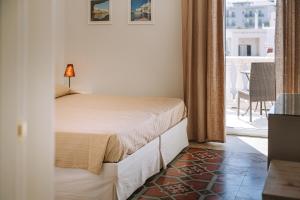 Letto o letti in una camera di Lamare cucina e dimore