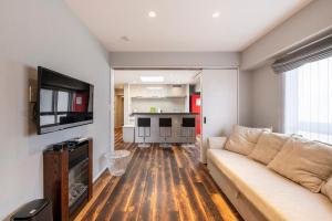 A cozinha ou cozinha compacta de NC Square Shinjuku -All Suite Residence-