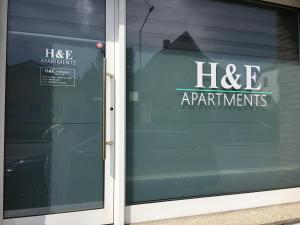 Ein Zertifikat, Auszeichnung, Logo oder anderes Dokument, das in der Unterkunft H&E Apartments Barntrup ausgestellt ist