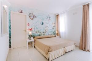 Letto o letti in una camera di Lamare cucina e dimore