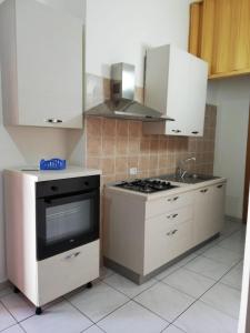 Η κουζίνα ή μικρή κουζίνα στο Lampedusa Home