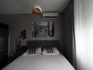 Postel nebo postele na pokoji v ubytování ORION OSIJEK-Studio