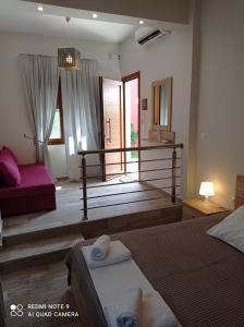 Posteľ alebo postele v izbe v ubytovaní Ethra luxury studios
