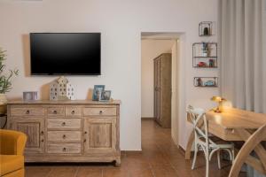 TV a/nebo společenská místnost v ubytování Iosif de Home + 25 fotografií