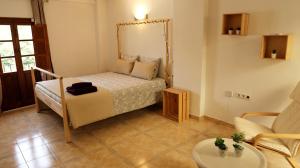 Postel nebo postele na pokoji v ubytování Casa del Almocabar