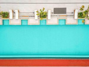 TV a/nebo společenská místnost v ubytování Novotel Vijayawada Varun