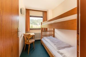 Postel nebo postele na pokoji v ubytování Hotel Starchlhof