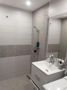 Koupelna v ubytování Oasis Beach Apartman