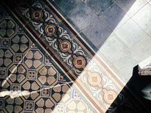 an overhead view of a room with a tile floor at Palazzo Gambuzza in Ispica