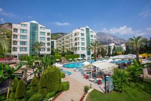 an aerial view of a resort with a swimming pool at Grand Ring Hotel in Beldibi