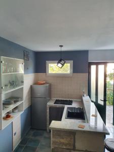 Η κουζίνα ή μικρή κουζίνα στο Apartmani Huljić