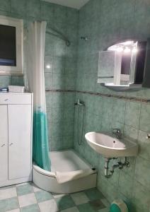 Ένα μπάνιο στο Apartmani Huljić