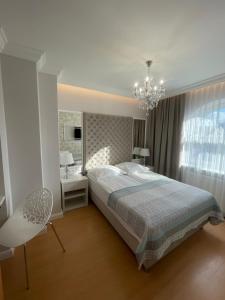 Posteľ alebo postele v izbe v ubytovaní Moris Boutique Beach Hotel + 37 fotografií