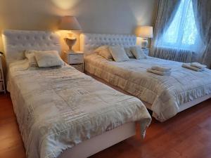 Ліжко або ліжка в номері Apartments Center Colmar 5