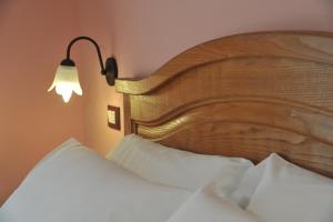 Postel nebo postele na pokoji v ubytování AFFITTACAMERE LA MAGIA DEI COLORI
