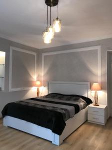 Postel nebo postele na pokoji v ubytování Guesthouse Levani