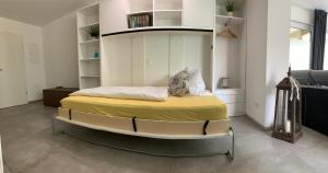 a bedroom with a large bed in a room at Firmen & Ferienwohnung Brecht 2 in Waibstadt